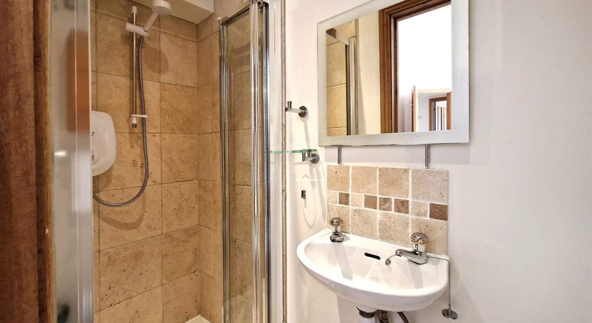 The ground floor double room has a handy en suite shower-room. 