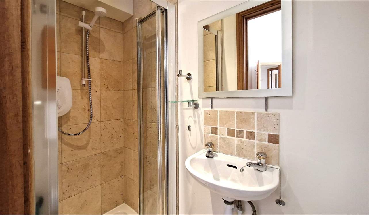 The ground floor double room has a handy en suite shower-room.