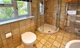 The bathroom has a separate shower and bath.  - Thumbnail Image