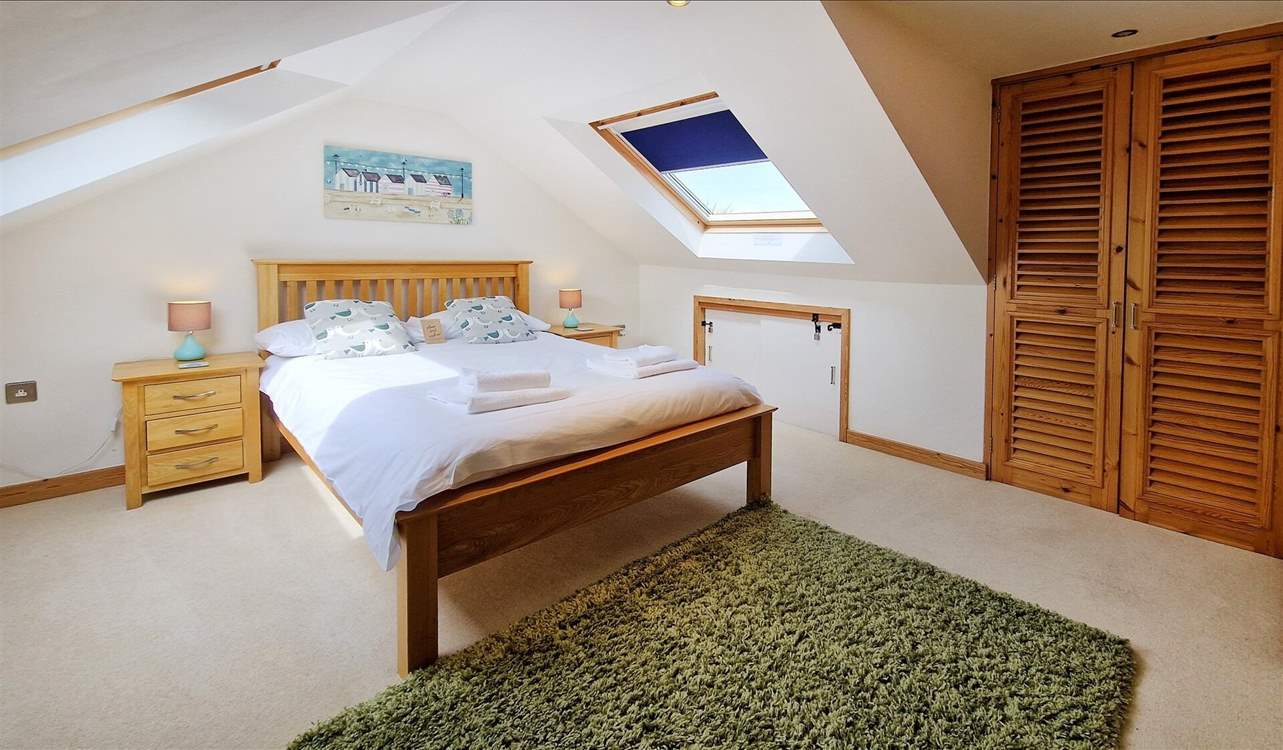 One of the spacious bedrooms.