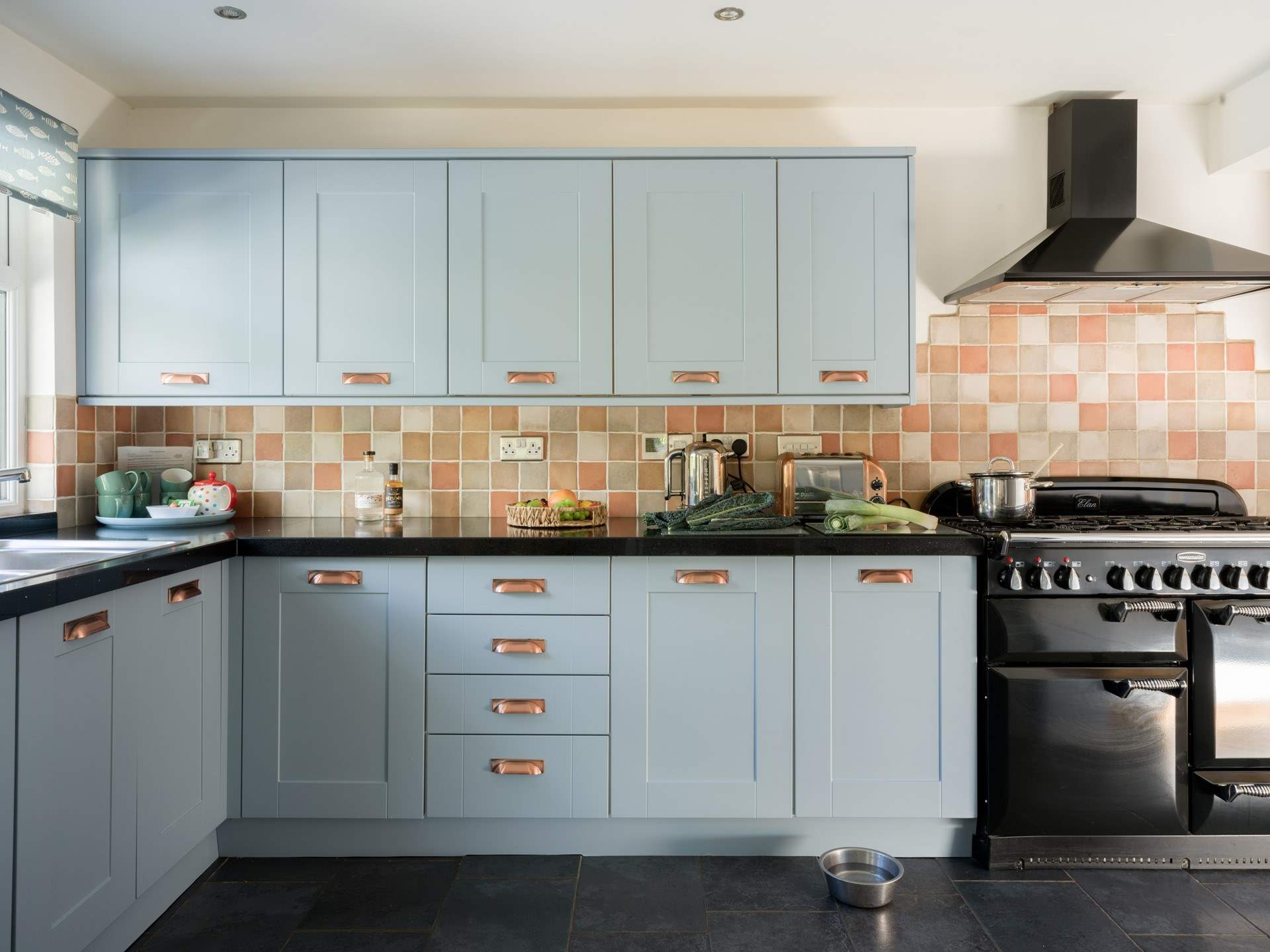 The kitchen is stylish and well-equipped.