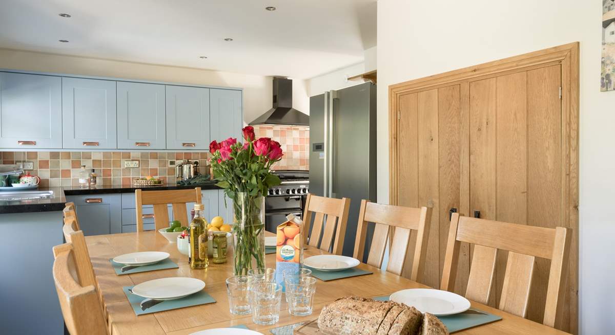 Gather everyone around the table in the kitchen/diner to enjoy a holiday meal. 