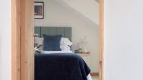 Head across the landing to find yet another spacious bedroom.