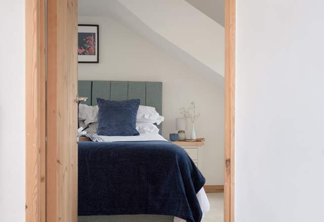 Head across the landing to find yet another spacious bedroom.