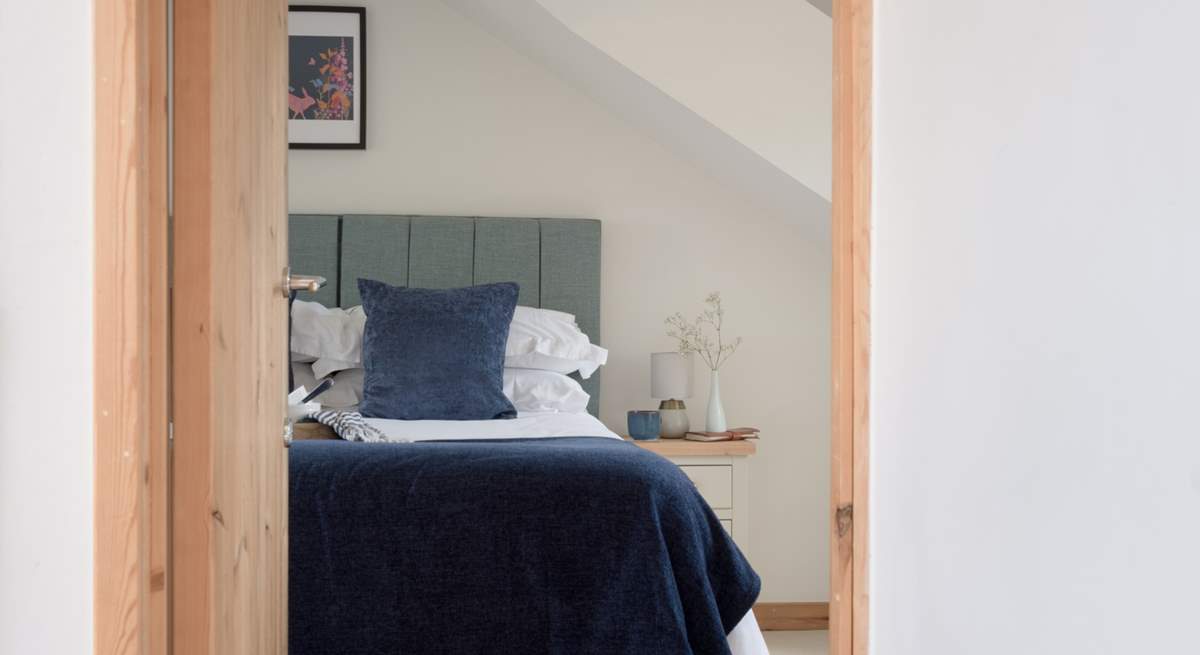 Head across the landing to find yet another spacious bedroom.