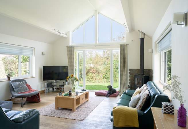 After a busy beach day, catch up with a drink and a movie on the Smart TV.