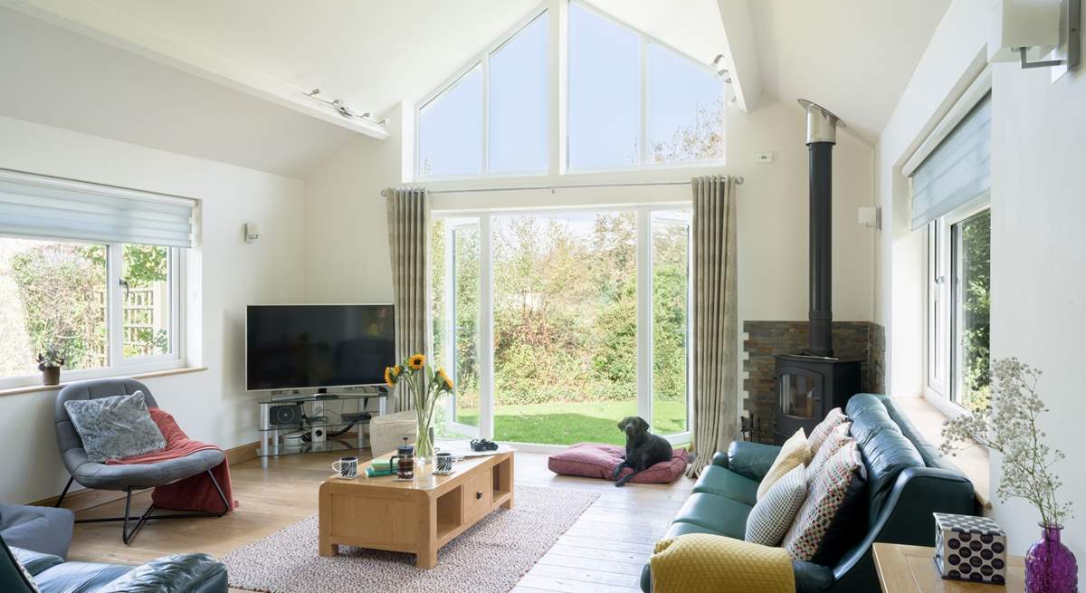 After a busy beach day, catch up with a drink and a movie on the Smart TV.