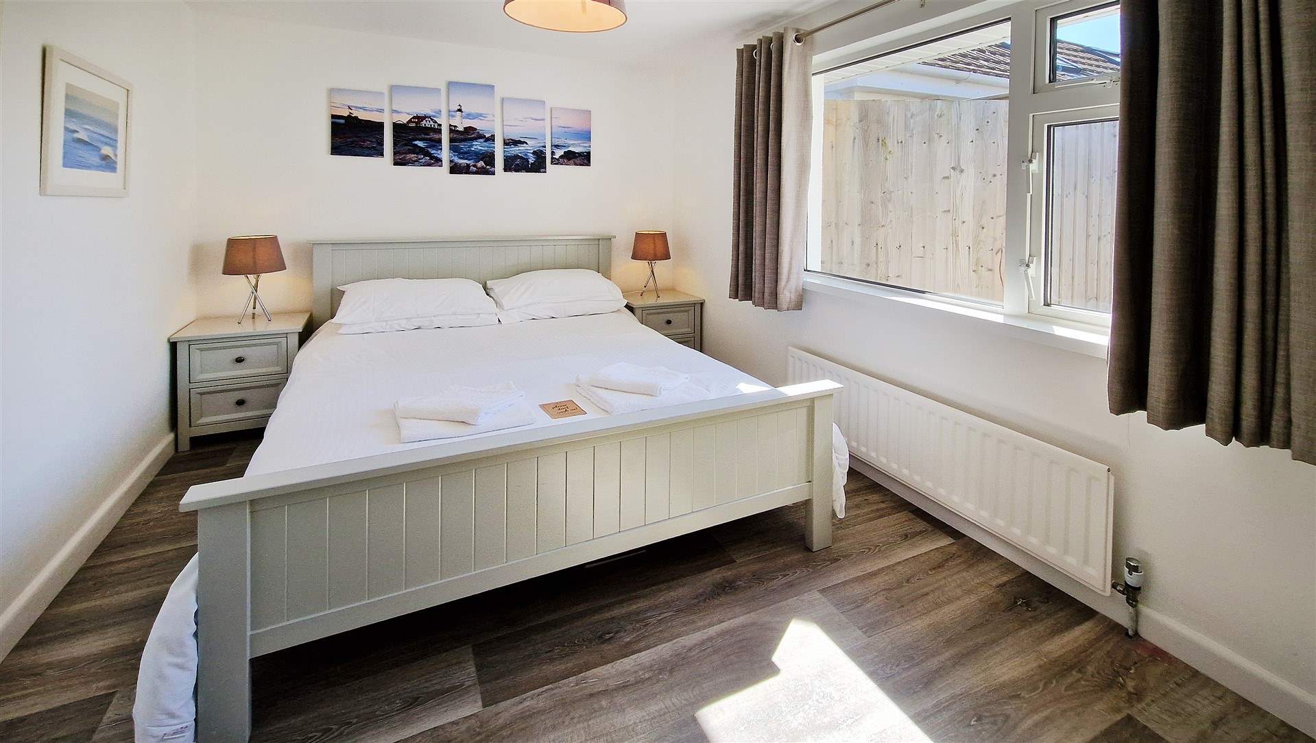 Bedroom 1 has a king-size bed.