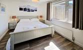 Bedroom 1 has a king-size bed. - Thumbnail Image