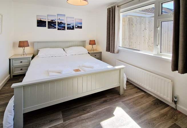 Bedroom 1 has a king-size bed.