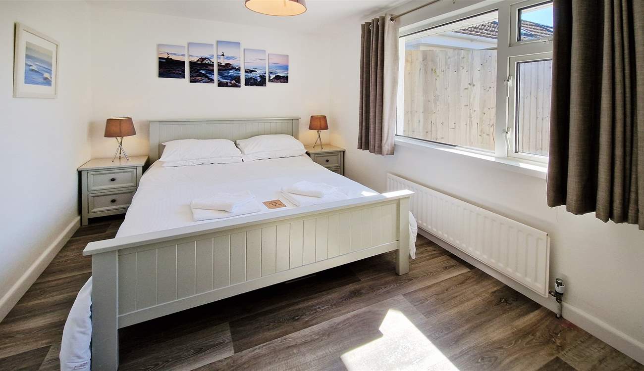 Bedroom 1 has a king-size bed.