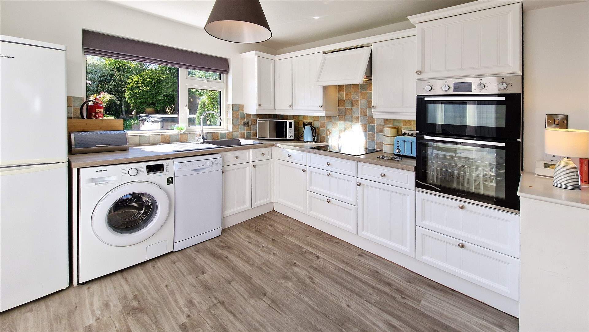 The kitchen looks out over the garden.