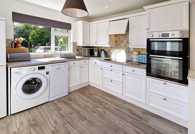 The kitchen looks out over the garden.