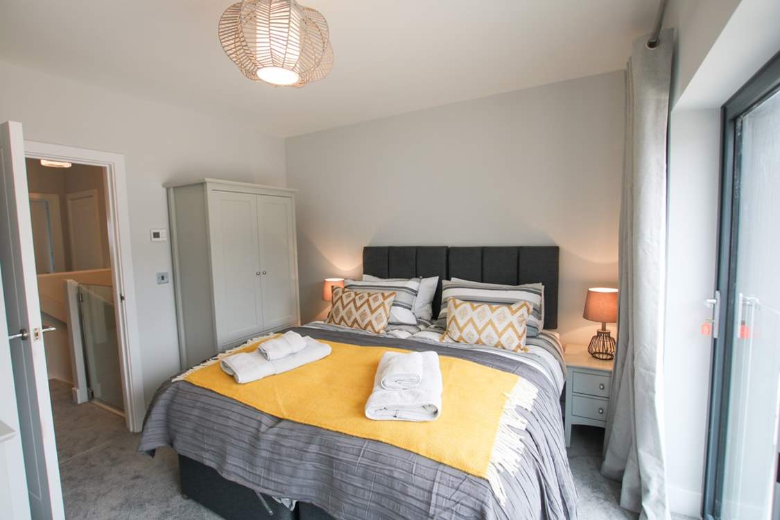 Bedroom 1 is stylishly furnished and can be made up as a king-size double or twin beds.