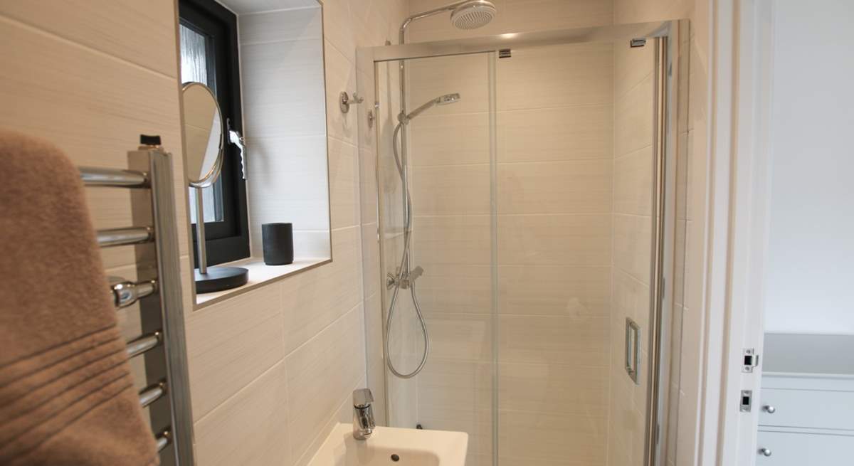 Bedroom 1 has an en suite shower-room. 