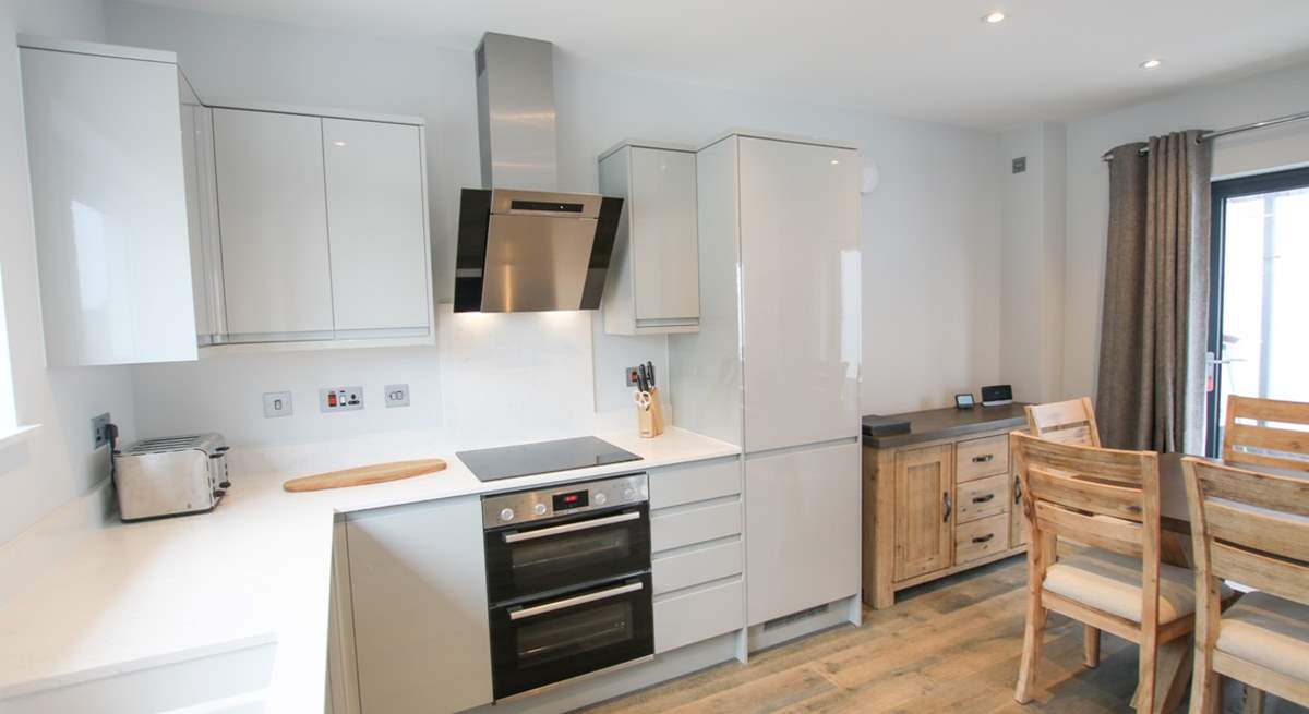 The sleek modern kitchen. 