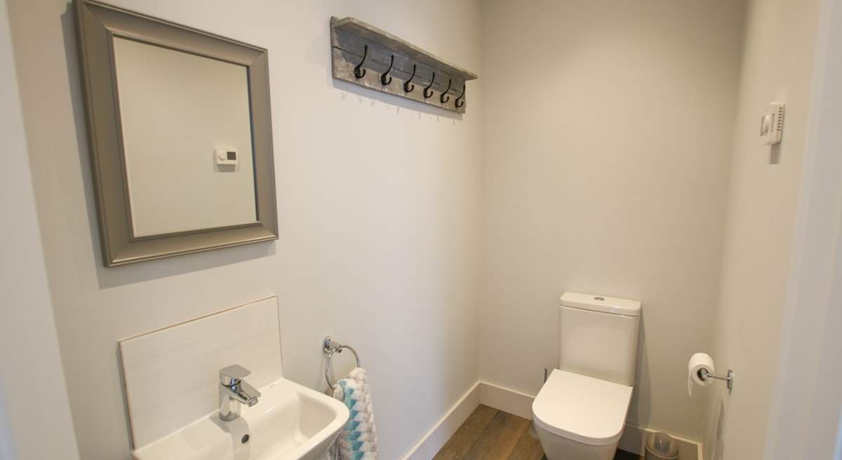 The handy ground floor cloakroom. 