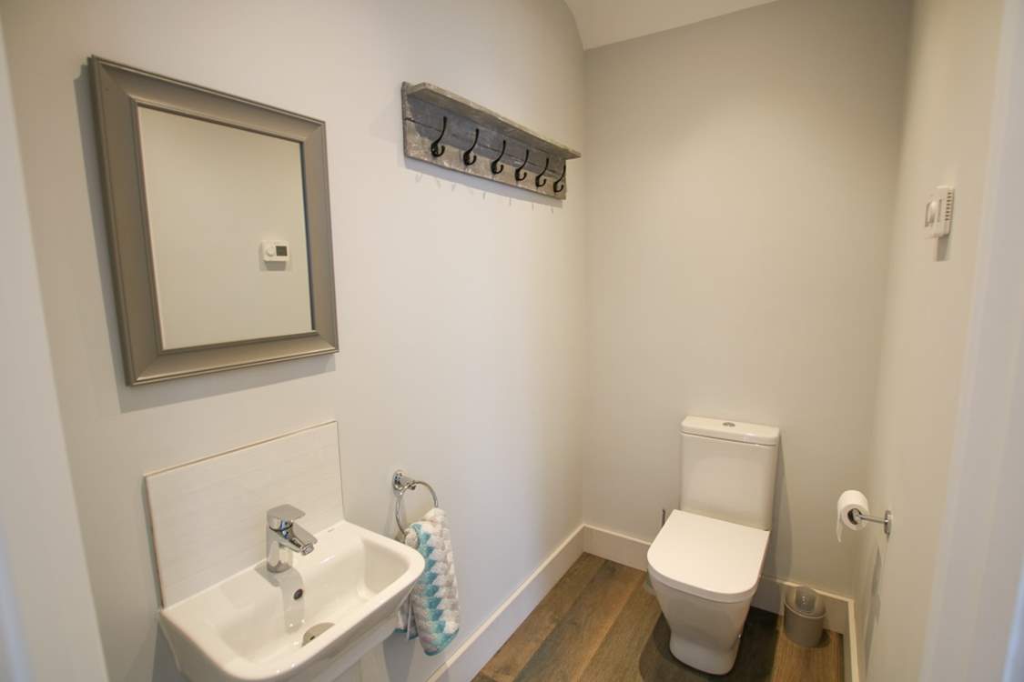 The handy ground floor cloakroom.