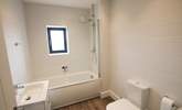 The family bathroom has a bath with shower over.  - Thumbnail Image