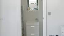 Bedroom 1 has an en suite shower-room.