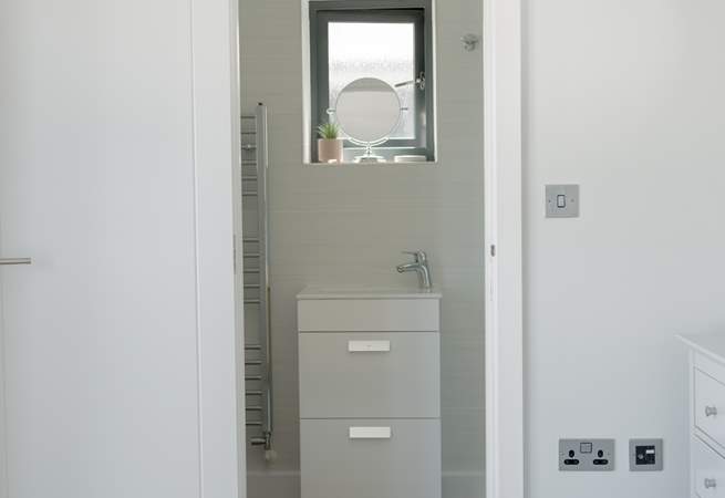 Bedroom 1 has an en suite shower-room.