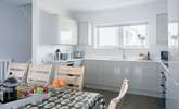 The sleek modern kitchen.  - Thumbnail Image