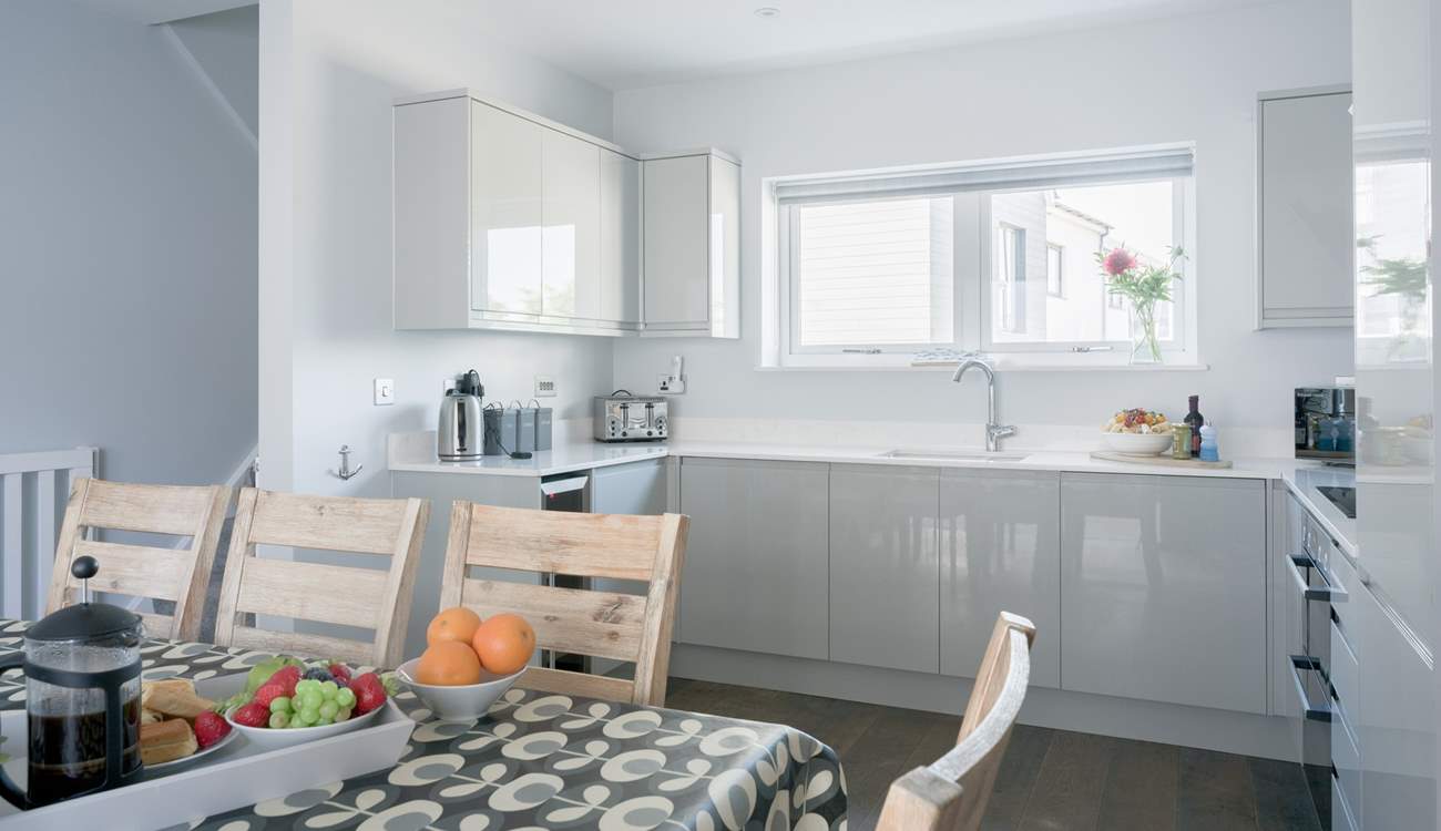 The sleek modern kitchen. 