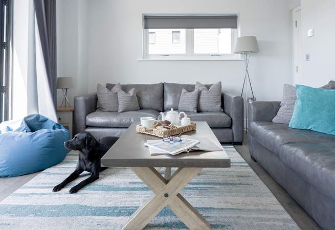 After a busy day, cuddle up on the sofa and catch a movie on the Smart TV.