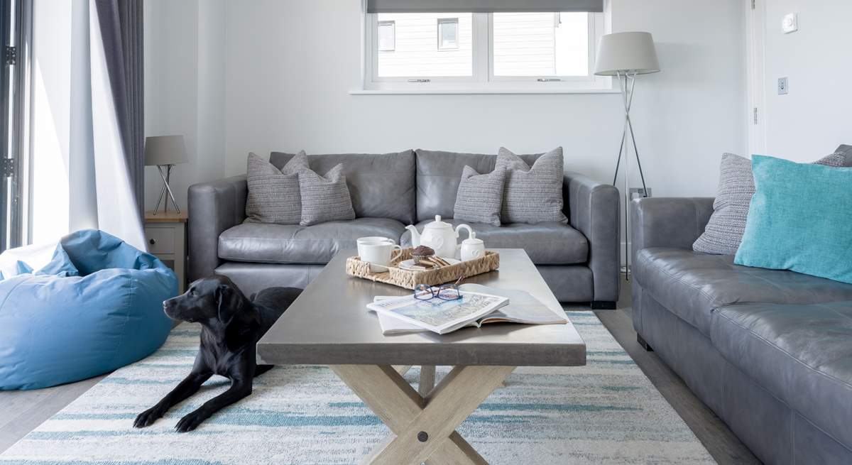 After a busy day, cuddle up on the sofa and catch a movie on the Smart TV.