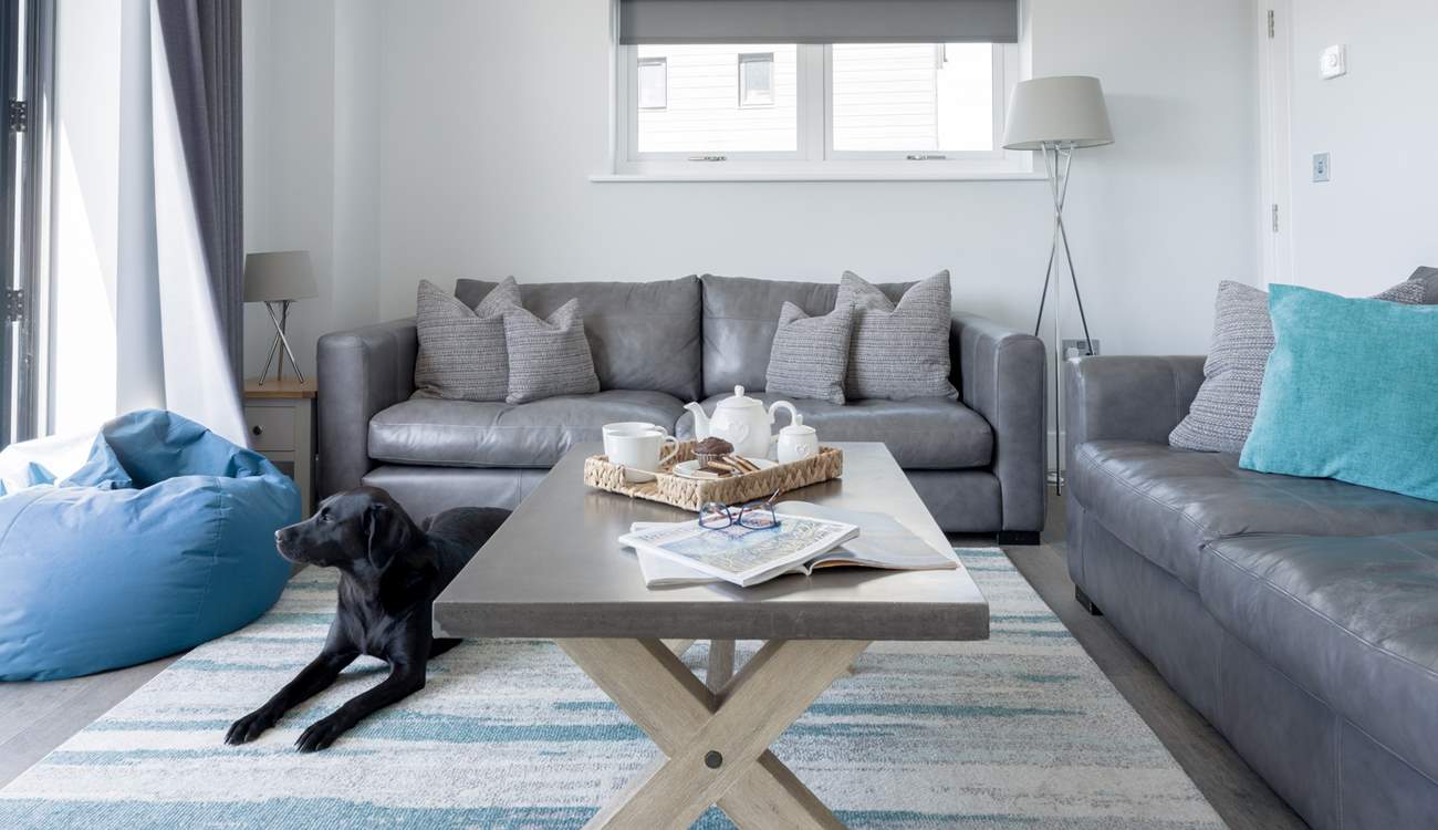 After a busy day, cuddle up on the sofa and catch a movie on the Smart TV.