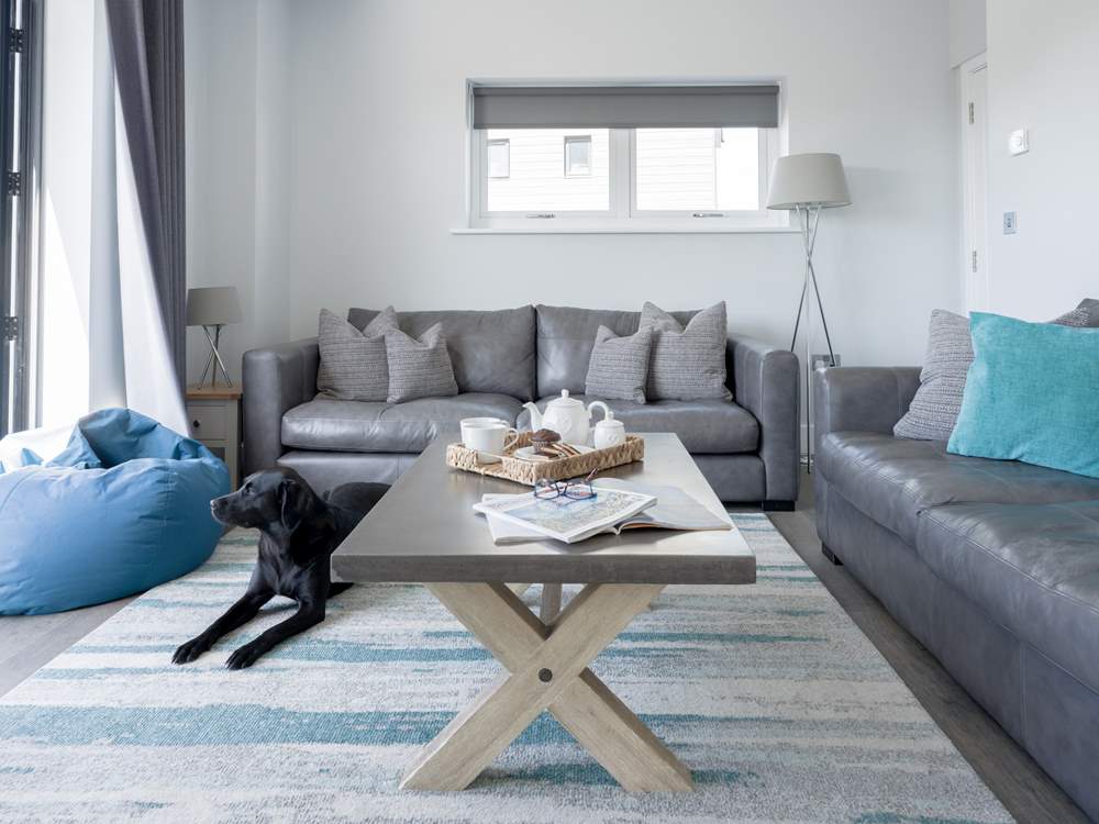 After a busy day, cuddle up on the sofa and catch a movie on the Smart TV.