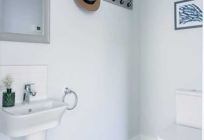 The handy ground floor cloakroom. 