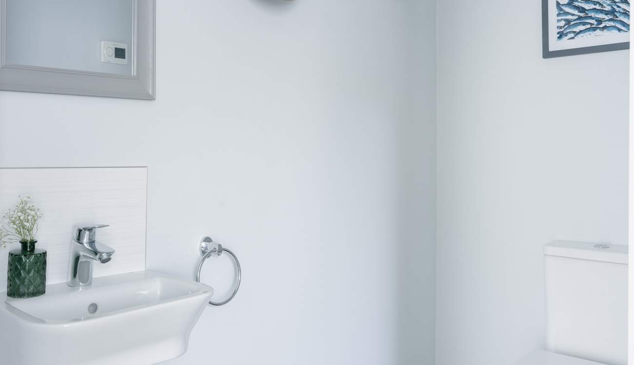 The handy ground floor cloakroom. 