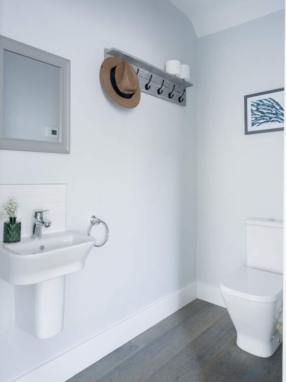 The handy ground floor cloakroom.