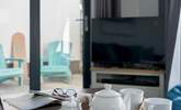 The Smart TV will keep everyone entertained after a busy beach day. - Thumbnail Image