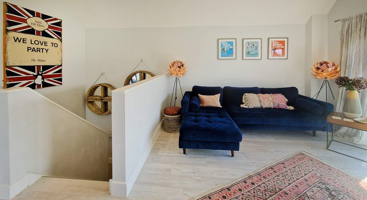Upstairs, unwind on the beautiful sofa.