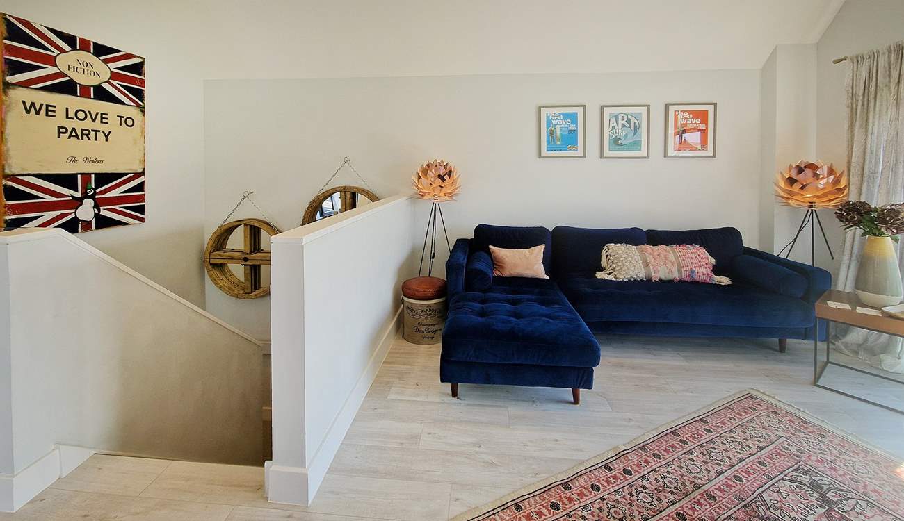 Upstairs, unwind on the beautiful sofa.