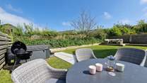 Gorgeous Trasona awaits your arrival. 
The large lawned garden has plenty of space to sit back and relax after enjoying the hot tub.