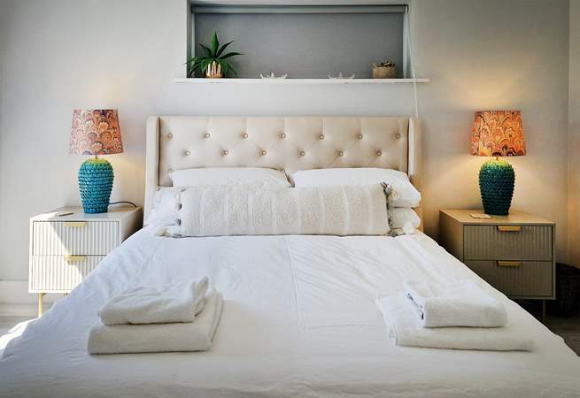 Bedroom 1 is a beautifully decorated room with a king bed.