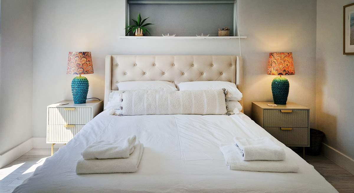 Bedroom 1 is a beautifully decorated room with a king bed.
