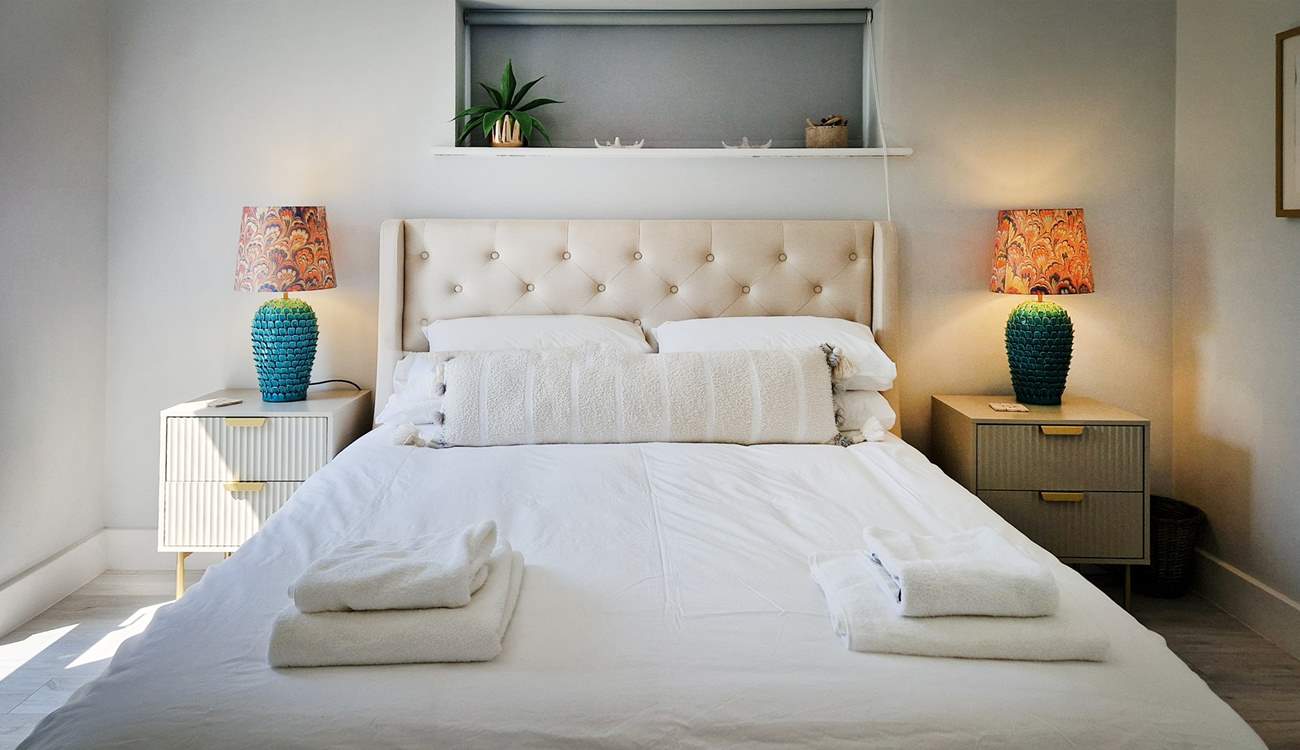 Bedroom 1 is a beautifully decorated room with a king bed.