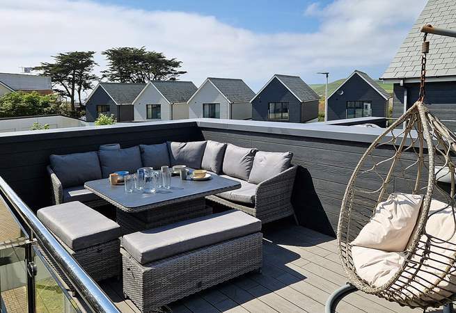 The French doors open out onto the balcony. Please note this is an older picture the roof work was completed a few years ago.