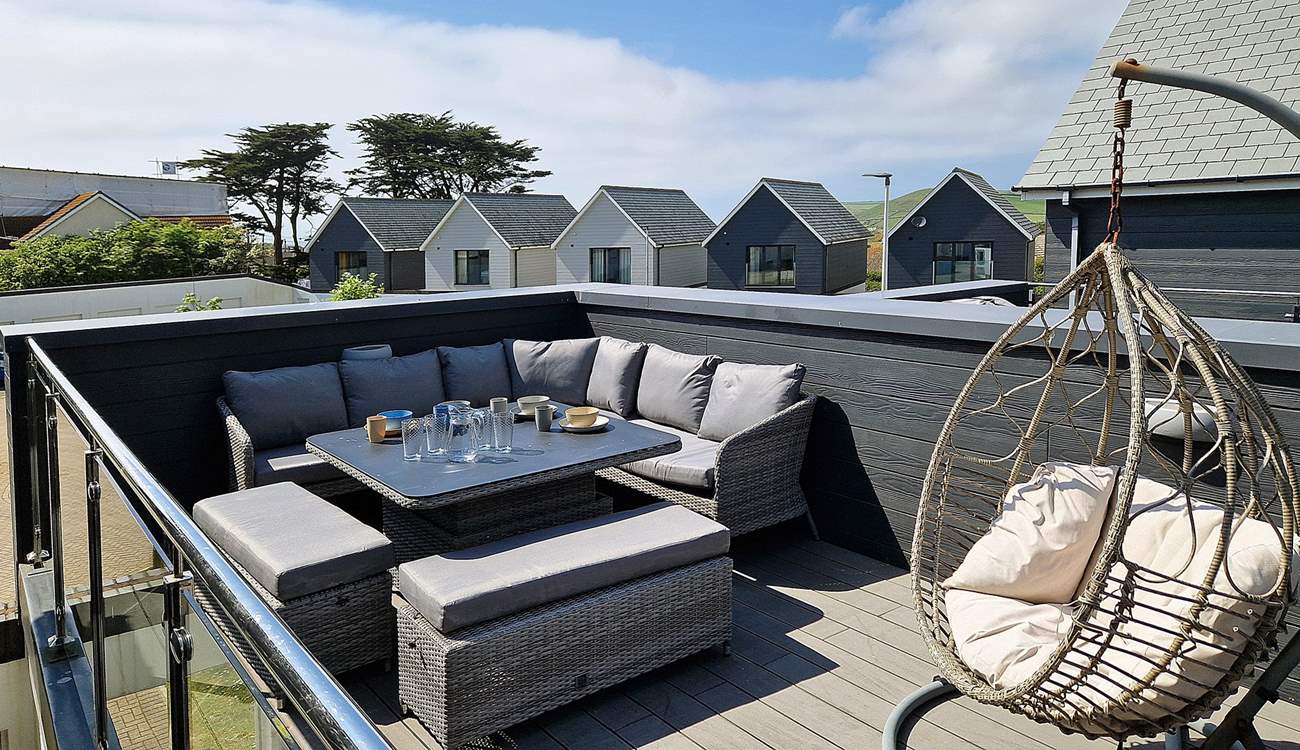 The French doors open out onto the balcony. Please note this is an older picture the roof work was completed a few years ago.