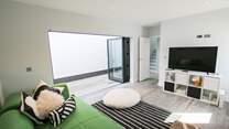 The garden-room is perfect for teenagers or if work calls. 