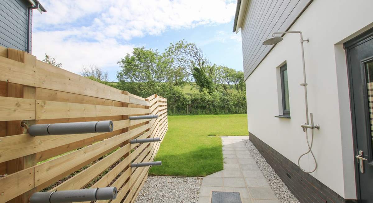 Here you'll find an outside shower, surf board storage and a wetsuit rail. 