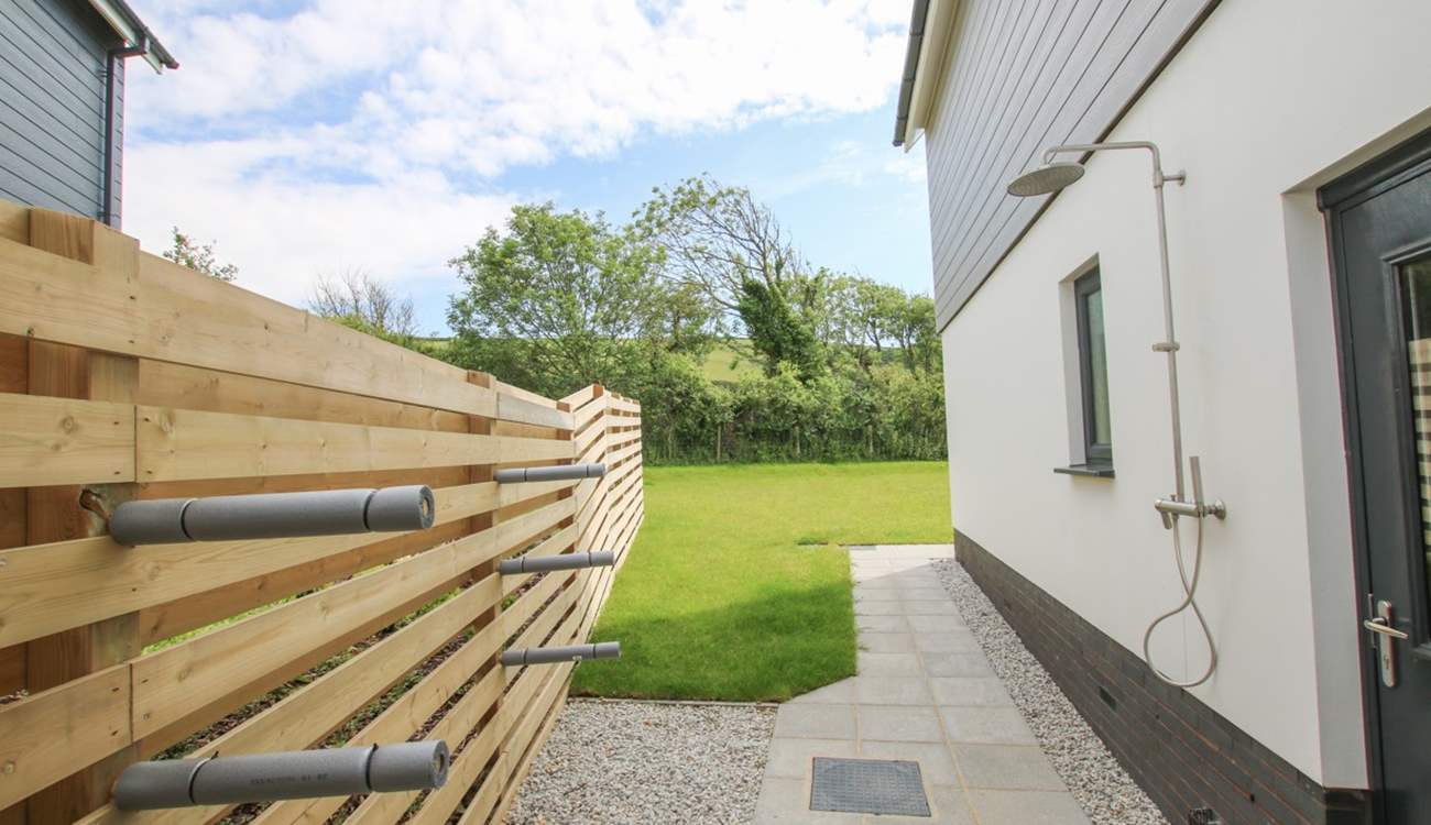 Here you'll find an outside shower, surf board storage and a wetsuit rail. 