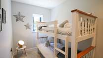 The bunk room will delight the children. 
