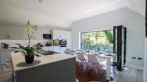 The bi-fold doors open up to let the fresh air in. 