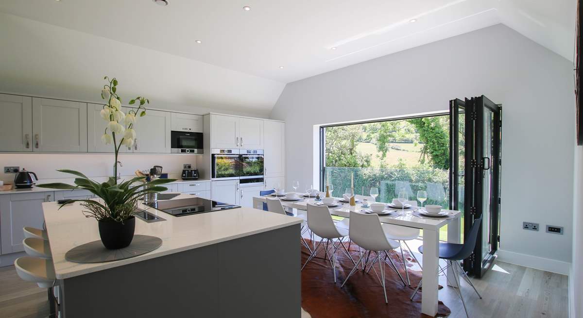 The bi-fold doors open up to let the fresh air in. 