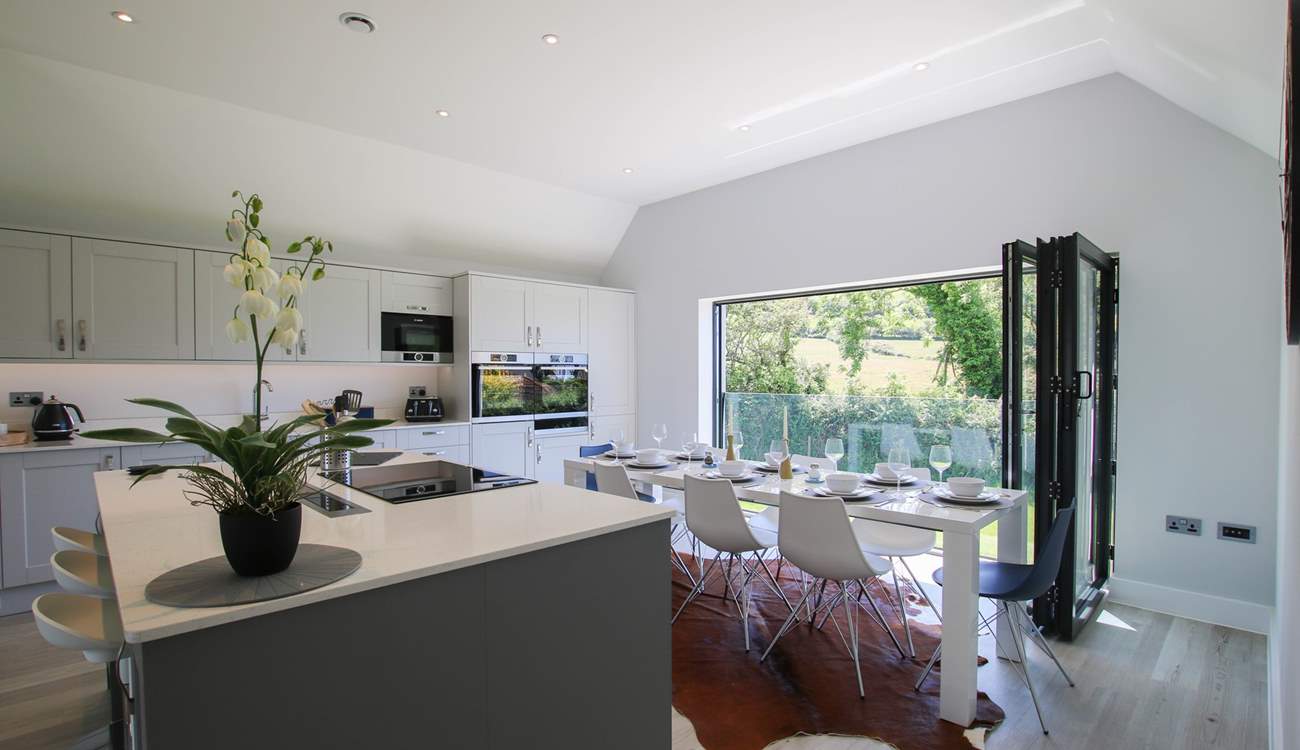 The bi-fold doors open up to let the fresh air in. 